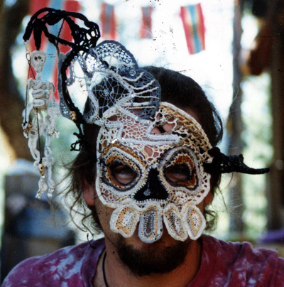 Needlelace skull mask with pullstring animated skeleton, handmade by C. Buffalo Larkin