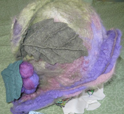 Pan Hat with Needlelace Veil (side view), welt felting and needle felting by C. Buffalo Larkin