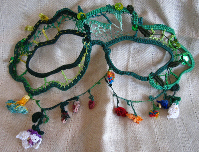 Flora needlelace mask with garland, handmade by C. Buffalo Larkin