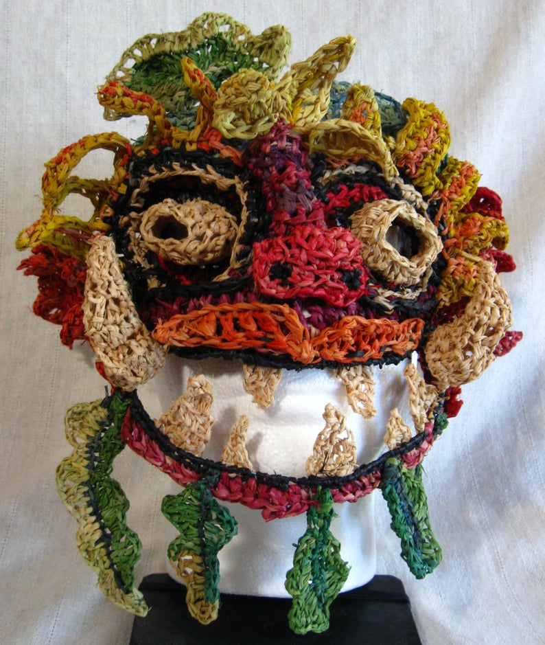 Balinese Demon Mask, crocheted raffia. Handmade by C. Buffalo Larkin