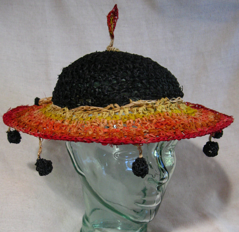Bomb Hat, crocheted raffia by C. Buffalo Larkin