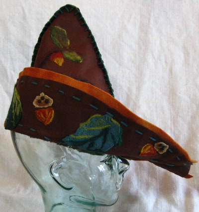 Robin Hood Hat (brown felt with needle felt ornamentation), made by C. Buffalo Larkin
