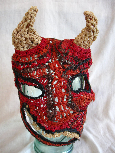 Himalayan Devil Mask, crocheted raffia by C. Buffalo Larkin