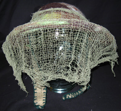 Felt Camouflage Hat with Netting, wet felting and needle felting by C. Buffalo Larkin