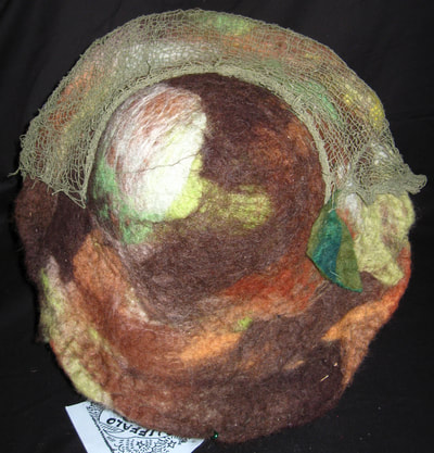 Felt Camouflage Hat with Netting (top view), wet felting and needle felting by C. Buffalo Larkin