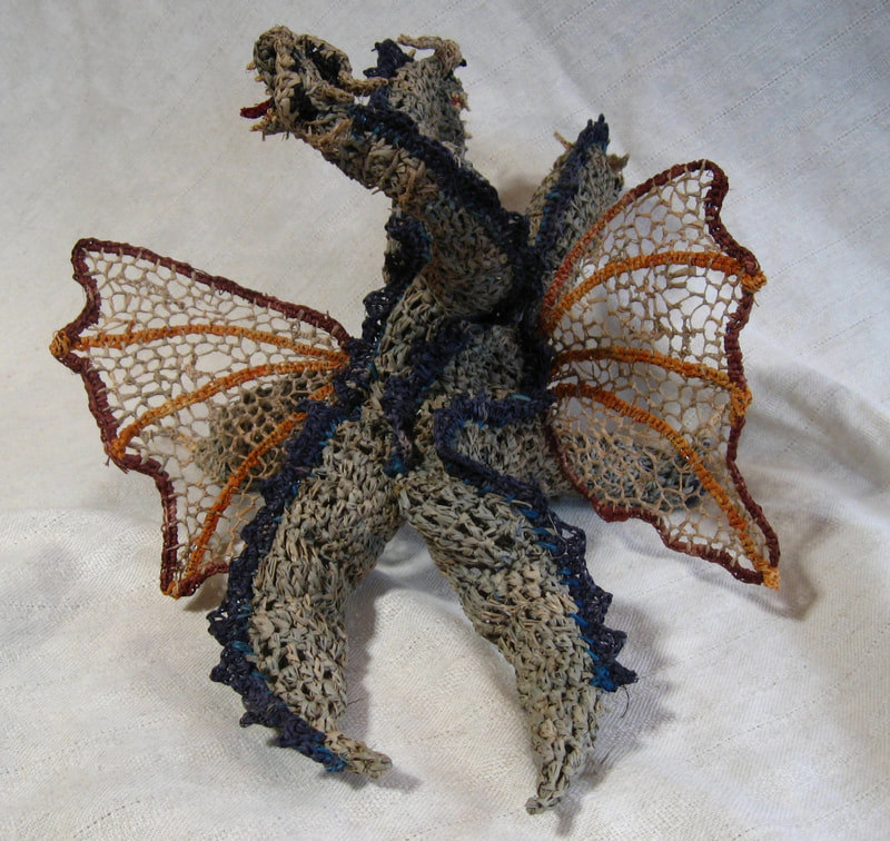 Ghidorah, crocheted raffia with needlelace wings