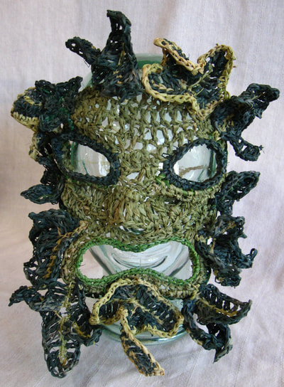 Green Man Mask, crocheted raffia by C. Buffalo Larkin
