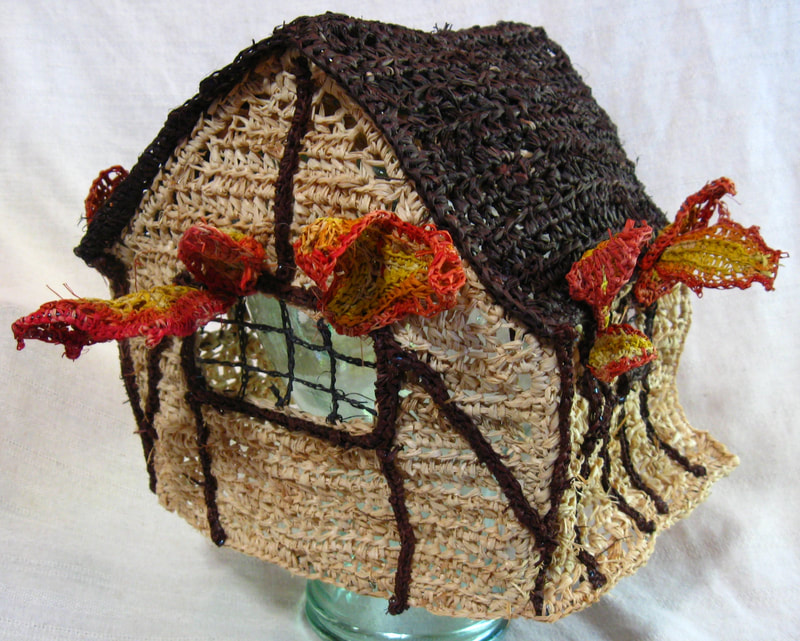 House on Fire Hat (rear view), crocheted raffia by C. Buffalo Larkin