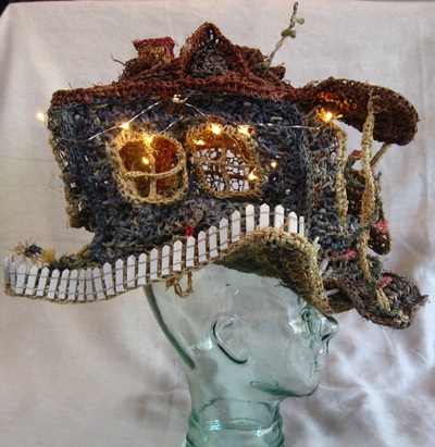 House Hat with Picket Fence (side view), crocheted raffia by C. Buffalo Larkin