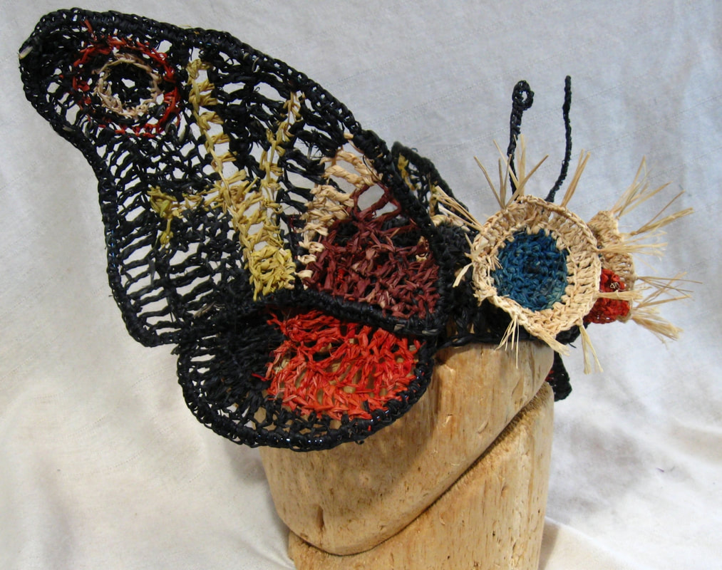 Mothra hat, crocheted raffia. Handmade by C. Buffalo Larkin