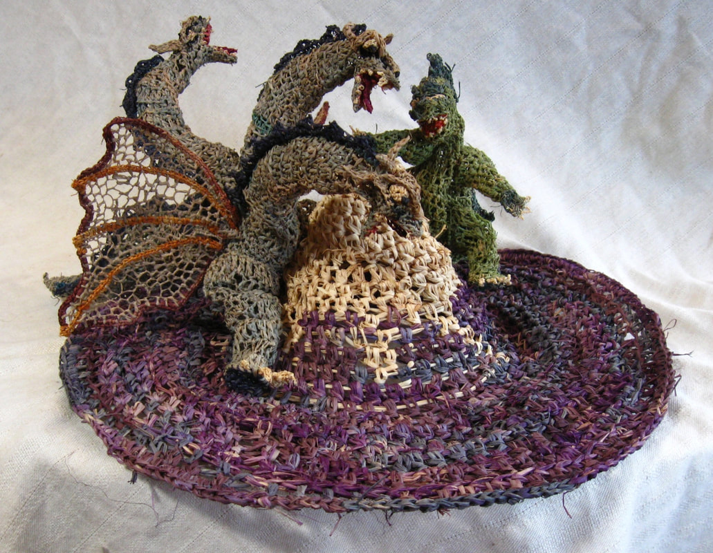 Godzilla v. Ghidorah Hat, crocheted raffia. Handmade by C. Buffalo Larkin