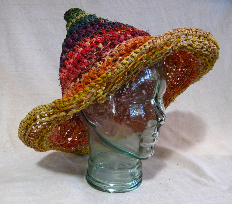 Sombrero in rainbow colors, crocheted raffia by C. Buffalo Larkin