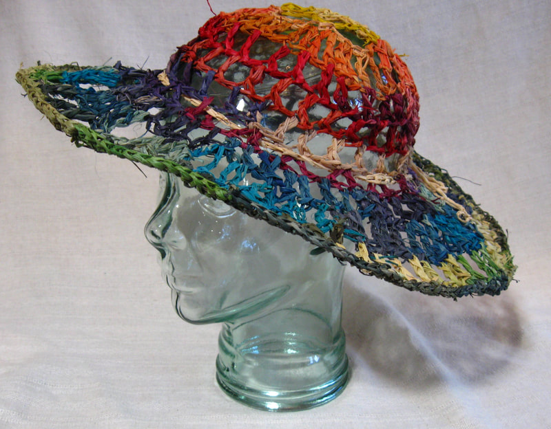 Sun Hat in rainbow colors, crocheted raffia by C. Buffalo Larkin